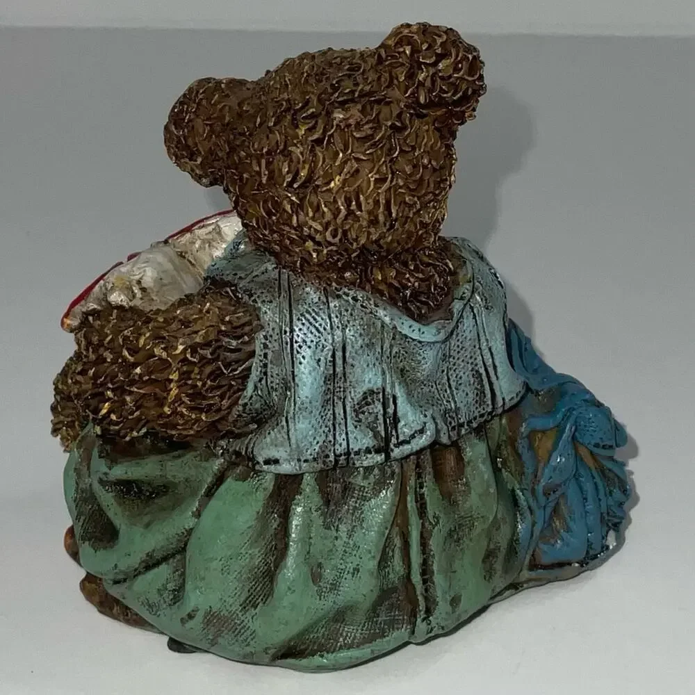 Cornerstone Creations collectible bear with book bag and reading a book.